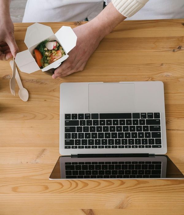 Person taking a mindful break from computer work.